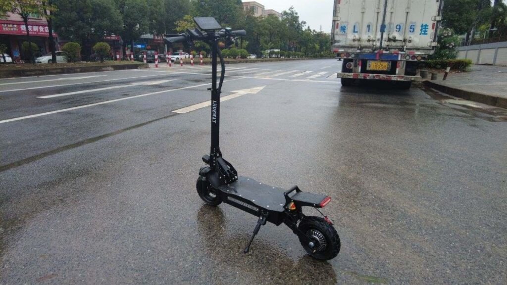 four wheel electric scooter in closed liideway factory